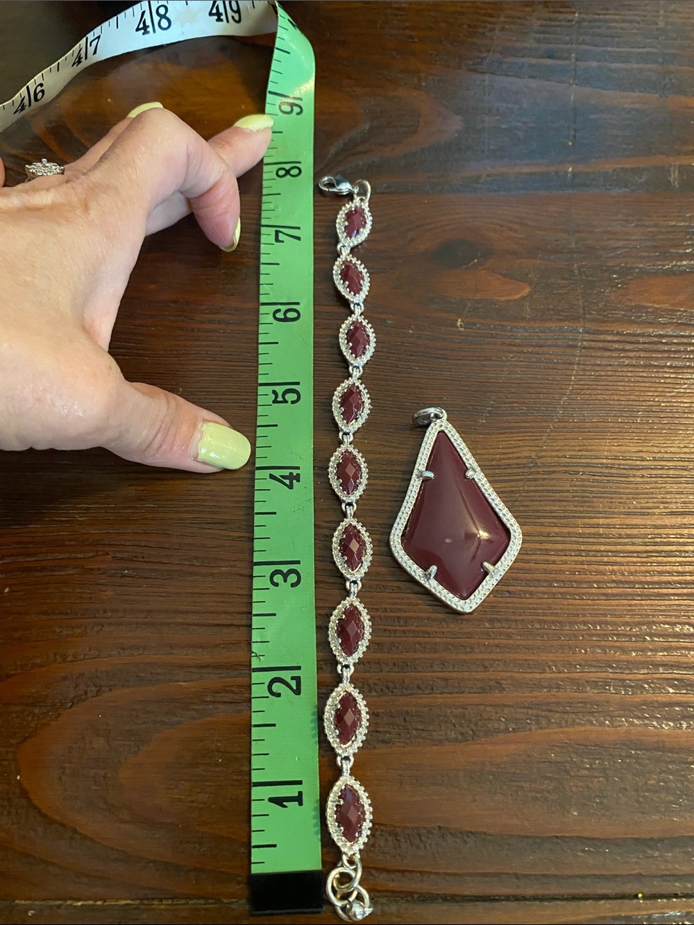 Women’s Bracelet & Pendant Set 
Deep Burgundy Stones.
No marking on either piece